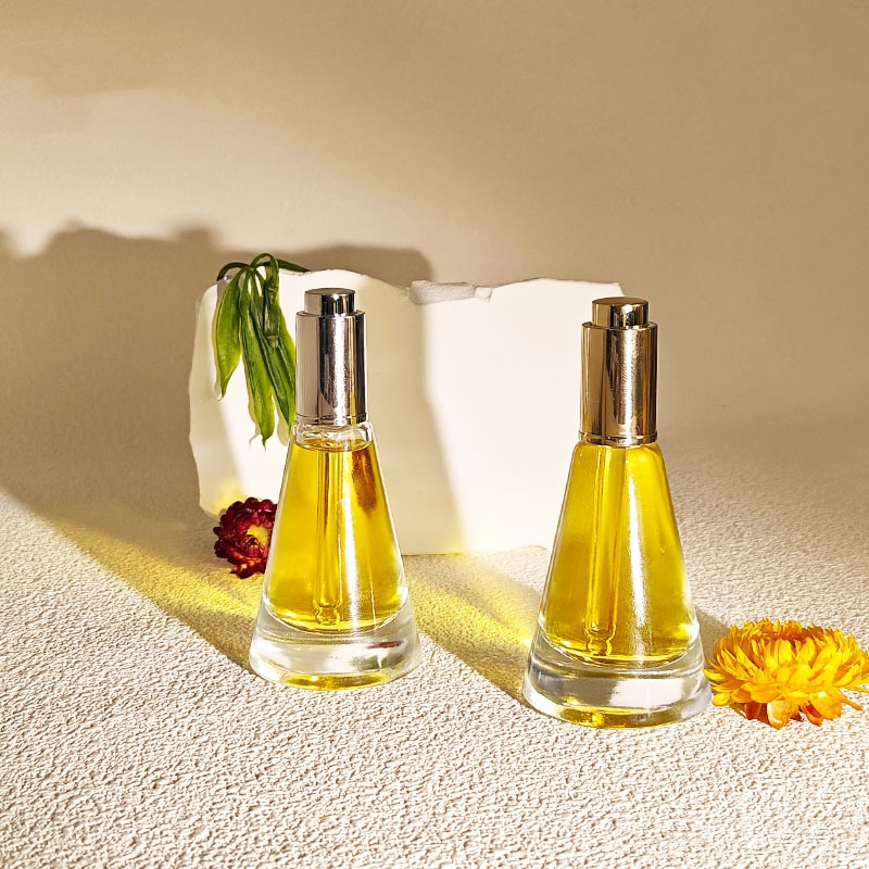 Kartiomainen lasinen kosmeettinen eteerinen öljypullo Kartiomainen lasinen kosmeettinen eteerinen öljypullo