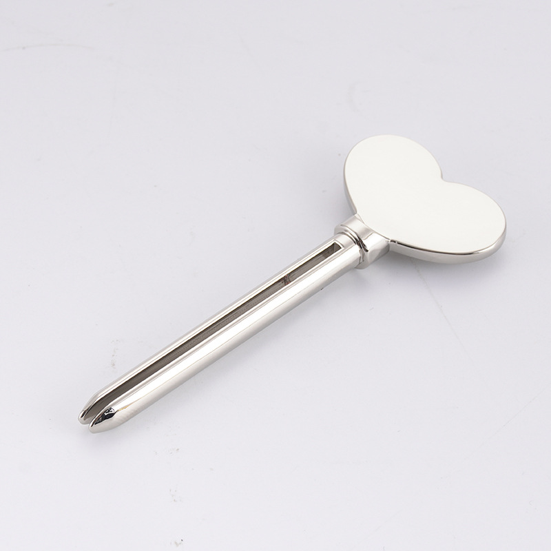 Metallinen hammastahna-annostelija kasvojen puhdistusaine hammastahnaputkipuristin Avaimen muoto Kosmetiikka Tube Puristin Metallinen hammastahna-annostelija kasvojen puhdistusaine hammastahnaputkipuristin Avaimen muoto Kosmetiikka Tube Puristin