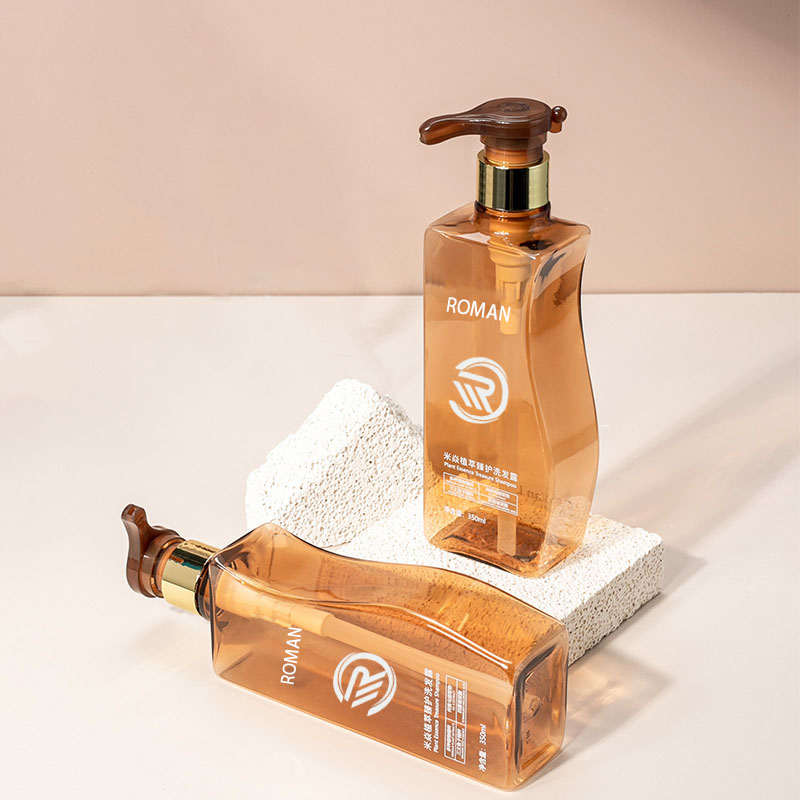 Luotettava 350 ml:n 500 ml:n kaarevan muotoinen meripihkanvärinen lemmikkieläinten muovinen tyhjä vartaloemulsiopullo pumpulla hiustenhoitoshampoohoitoon tai kasvovoiteeseen Luotettava 350 ml:n 500 ml:n kaarevan muotoinen meripihkanvärinen lemmikkieläinten muovinen tyhjä vartaloemulsiopullo pumpulla hiustenhoitoshampoohoitoon tai kasvovoiteeseen