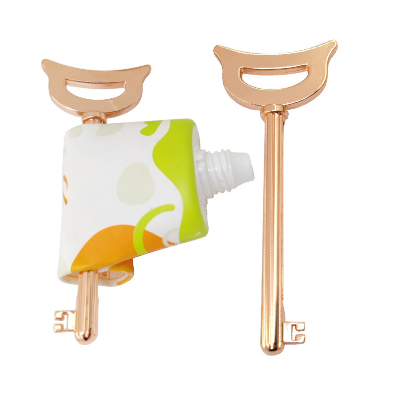 Ainutlaatuinen avaimen muotoinen sinkkiseosputkipuristin hammastahnakosmetiikkaa varten Cream Color Pack Ainutlaatuinen avaimen muotoinen sinkkiseosputkipuristin hammastahnakosmetiikkaa varten Cream Color Pack